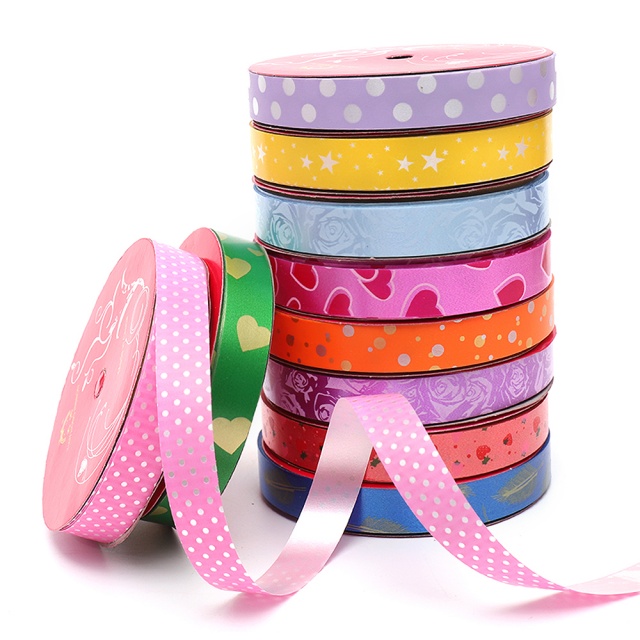 Custom Printed Decorative Ribbons with Vibrant Patterns for Gift Packaging.