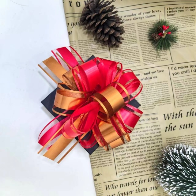 Tirez le ruban &agrave; nœud de Chine Manufctoy. Facile &agrave; utiliser, gain de temps et disponible en diff&eacute;rentes couleurs et styles.