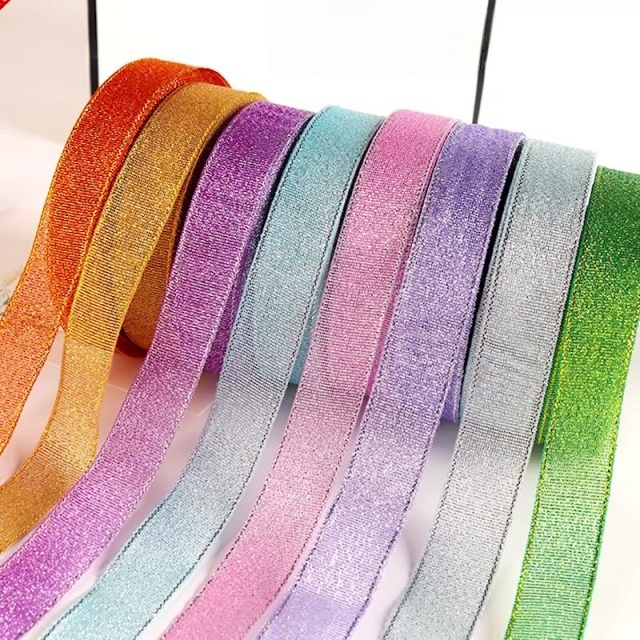 Shiny Metallic Ribbon for Festive Gift Wrapping. Durable, Sparkly Finish Perfect for Holidays And Special Occasions. Multiple Colors Available.