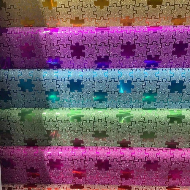 Sparkling Glitter Paper Paired with Coordinated Ribbons in Elegant Sets. Perfect for Creating Dazzling Gift Presentations Effortlessly.