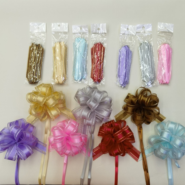 Structured Metal Lace Pom Bows with Intricate Patterns for Luxury Gifts.