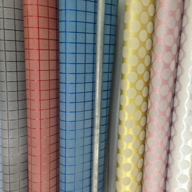 Sparkling Glitter Paper Paired with Coordinated Ribbons in Elegant Sets. Perfect for Creating Dazzling Gift Presentations Effortlessly.