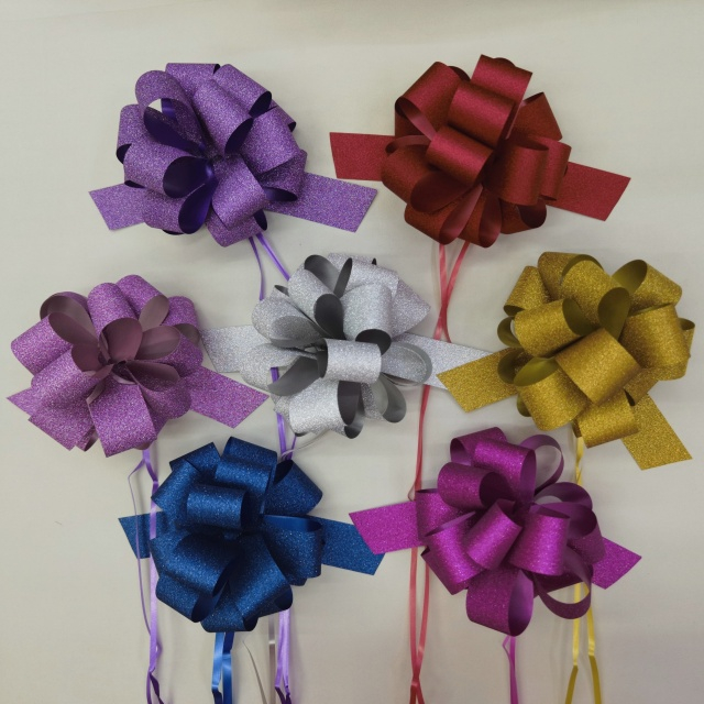 Packvips 32mm Glitter Pom Bows with Full Sparkle Coverage for Eye-catching Gifts.
