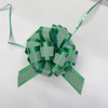 Dimensional Striped Double-layer Pom Bows for Luxurious Gift Presentations.