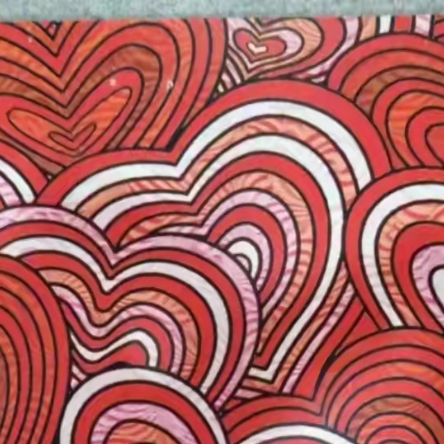 Premium glossy art paper with brilliant high-gloss finish for vibrant gift packaging.