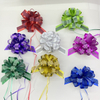 China Supplier Dimensional Striped Double-layer Pom Bows for Luxurious Gift Presentations.