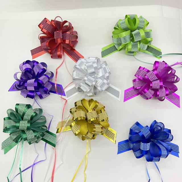 Dimensional Striped Double-layer Pom Bows for Luxurious Gift Presentations.