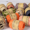 Pre-cut colored rope sets in organized boxes for convenient crafting and decorations.