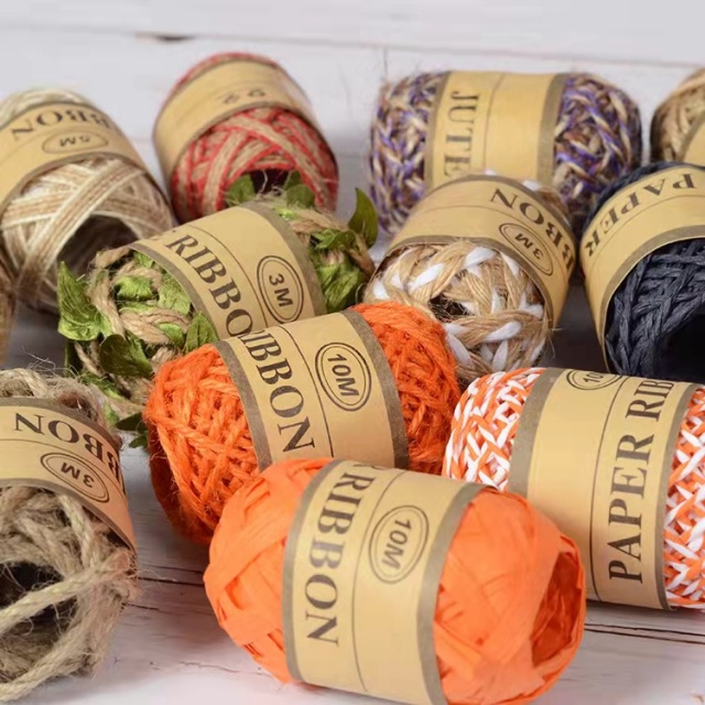 Pre-cut colored rope sets in organized boxes for convenient crafting and decorations.