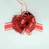 Soft gauze pom bows with delicate texture for elegant gift decoration.