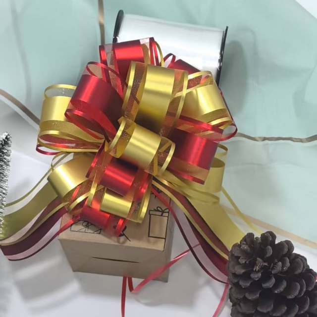 Tirez le ruban &agrave; nœud de Chine Manufctoy. Facile &agrave; utiliser, gain de temps et disponible en diff&eacute;rentes couleurs et styles.