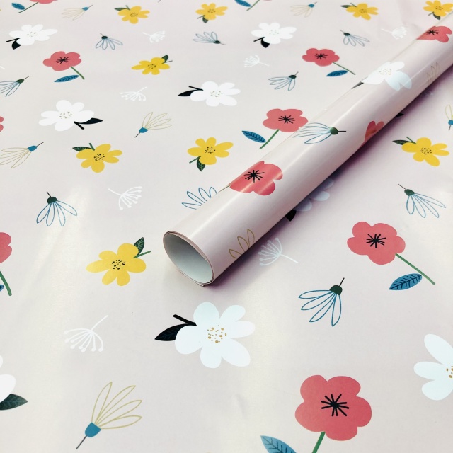 Premium glossy art paper featuring vibrant five-color floral patterns for elegant gift wrapping.