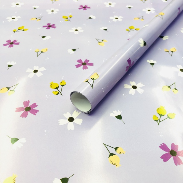 Premium glossy art paper featuring vibrant five-color floral patterns for elegant gift wrapping.