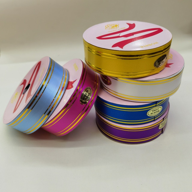 China Gold edged Ribbons Featuring Precise Gold Edge Trimming for Luxury Packaging And Special Occasions.