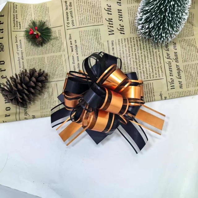 Tirez le ruban &agrave; nœud de Chine Manufctoy. Facile &agrave; utiliser, gain de temps et disponible en diff&eacute;rentes couleurs et styles.