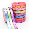 Custom Printed Decorative Ribbons with Vibrant Patterns for Gift Packaging.